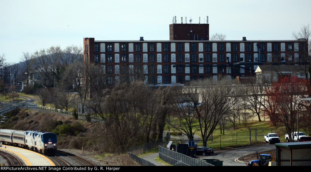 Former Craddock-Terry West End factory (they made shoes) looms over Amtrak Crescent as it boards passengers